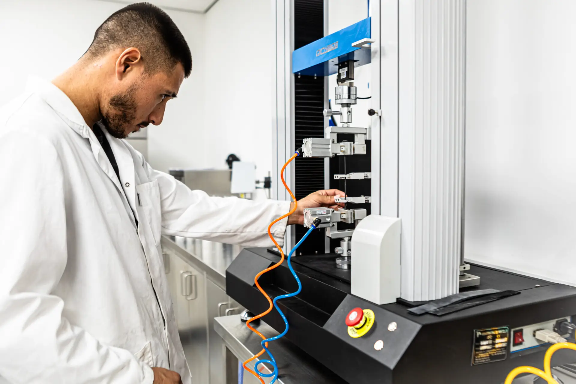 Technician testing sealant in the TackPartner laboratory